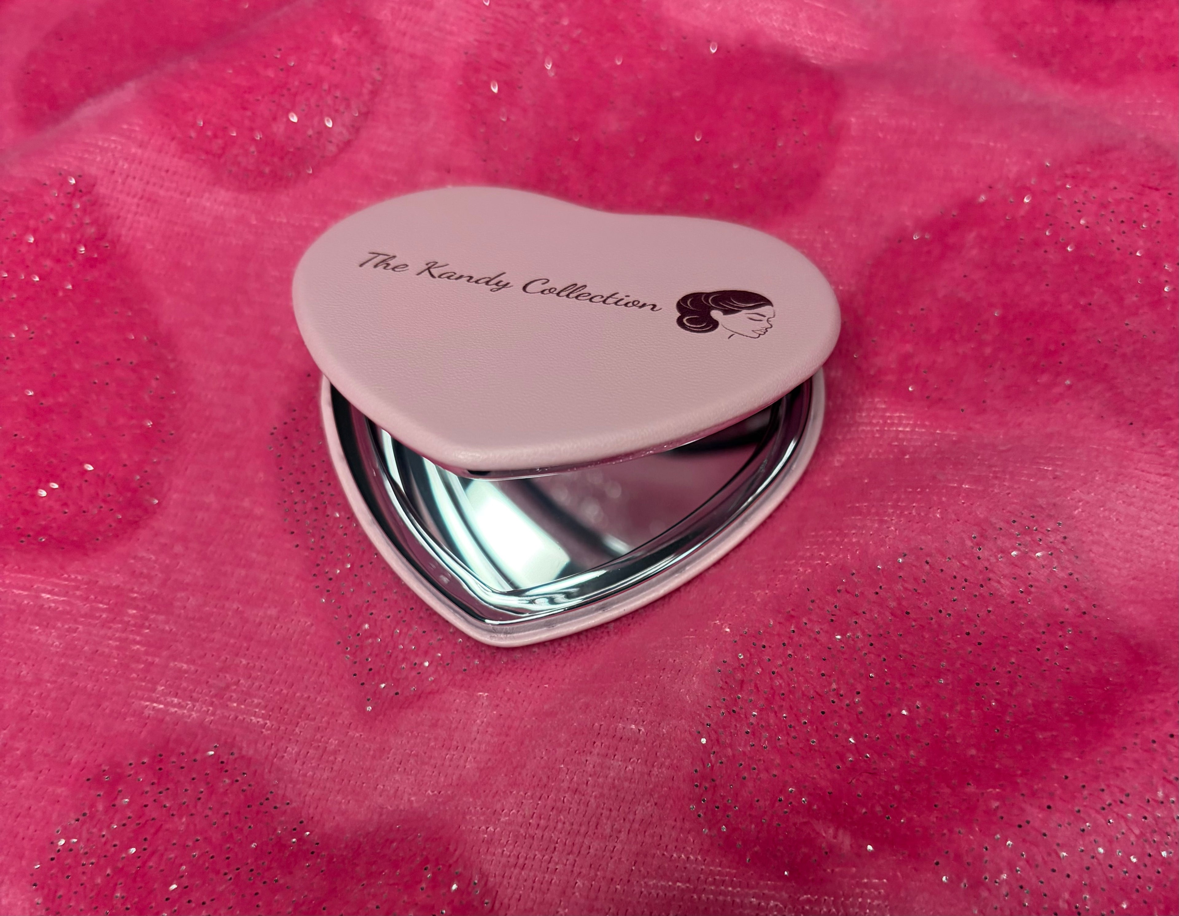 Pink pocket size mirror